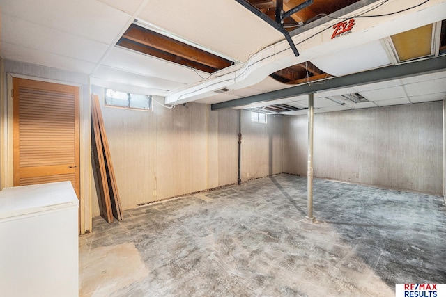 5704 N 68th St, Omaha, NE 68104 - basement with white fridge