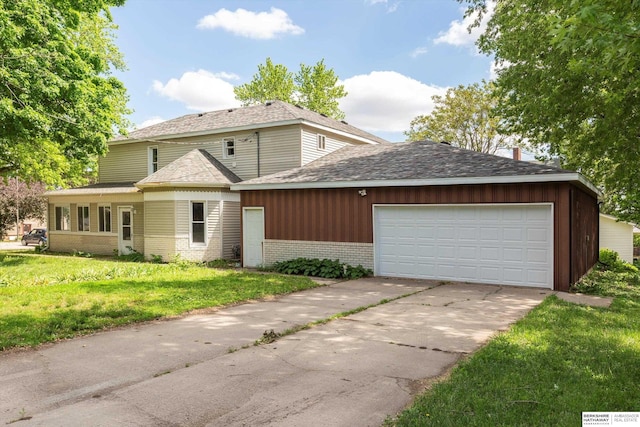 355 N 8th St, Arlington, NE 68002 - view of front of home with brick siding, a front lawn, an attached garage, concrete driveway, and roof with shingles