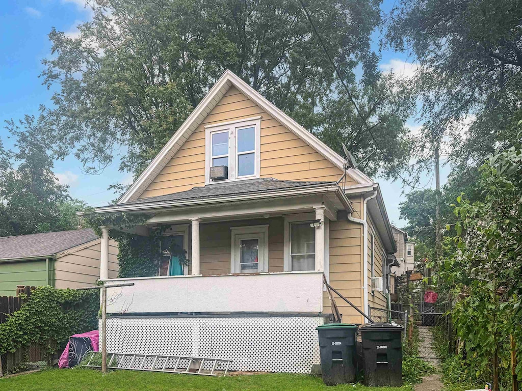 1947 S 13th St, Omaha, NE 68108 - view of front of property featuring a porch