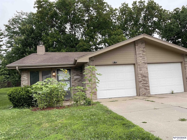 2528 Benson Gardens Blvd, Omaha, NE 68134 - view of front of property with brick siding, a chimney, a front yard, a shingled roof, and driveway