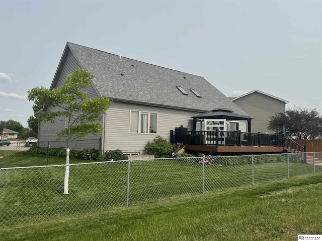 13410 Highlander Pl, Waverly, NE 68462 - back of property featuring a gazebo, a wooden deck, a shingled roof, and a fenced backyard