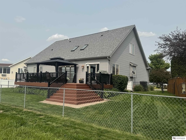 13410 Highlander Pl, Waverly, NE 68462 - rear view of house with a gazebo, roof with shingles, a deck, and a fenced backyard