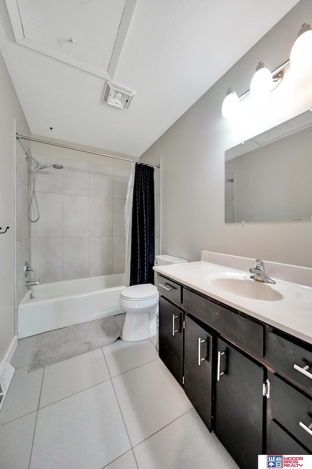 631 Overlook Ln, Beatrice, NE 68310 - bathroom with toilet, shower / tub combo with curtain, vanity, and tile patterned floors