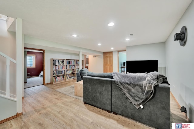 631 Overlook Ln, Beatrice, NE 68310 - living room with baseboards, light wood-type flooring, and recessed lighting