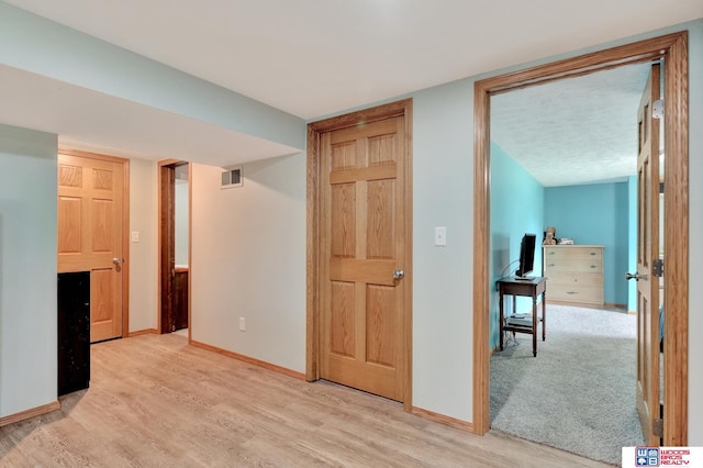 631 Overlook Ln, Beatrice, NE 68310 - unfurnished living room with wood finished floors and baseboards