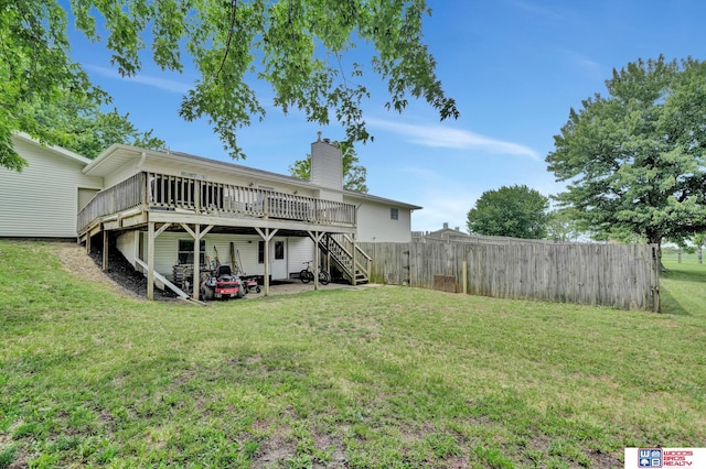 631 Overlook Ln, Beatrice, NE 68310 - back of house with stairs, a wooden deck, and a chimney