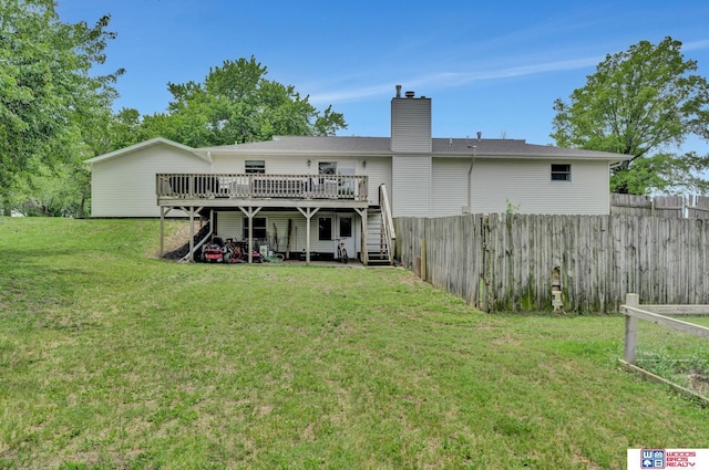 631 Overlook Ln, Beatrice, NE 68310 - rear view of property with a deck, stairs, and a chimney