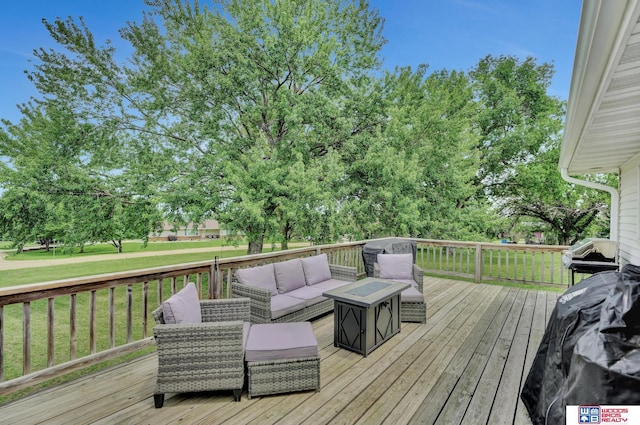 631 Overlook Ln, Beatrice, NE 68310 - wooden terrace featuring outdoor lounge area, grilling area, and a yard