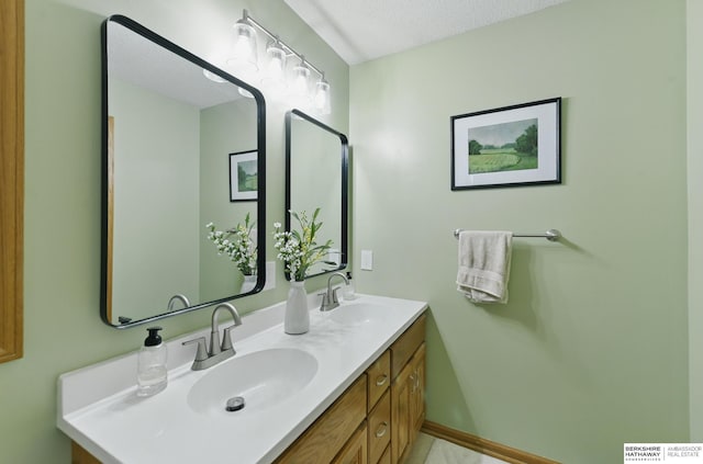 2442 E 2nd St, Fremont, NE 68025 - bathroom featuring double vanity