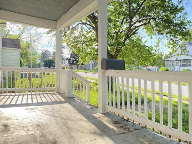3719 X St, Omaha, NE 68107 - covered porch with a residential view