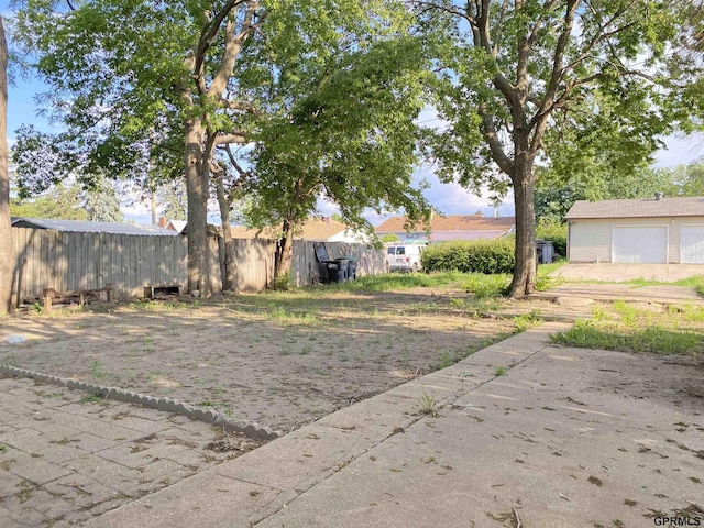 3719 X St, Omaha, NE 68107 - view of yard with a garage
