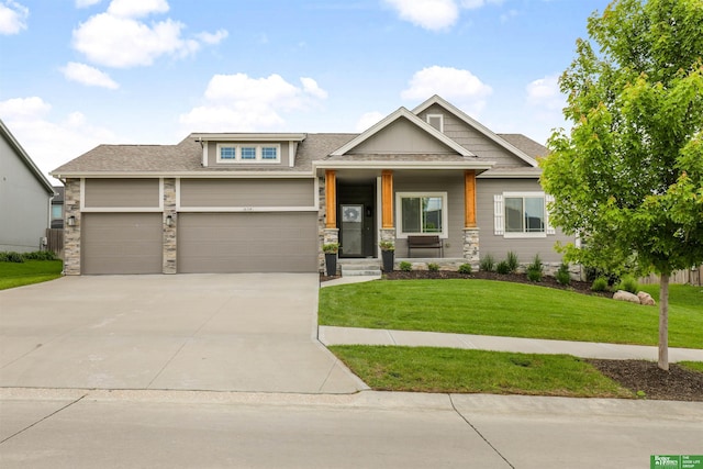 16314 Weber St, Bennington, NE 68007 - craftsman house featuring a front lawn, driveway, roof with shingles, stone siding, and a garage