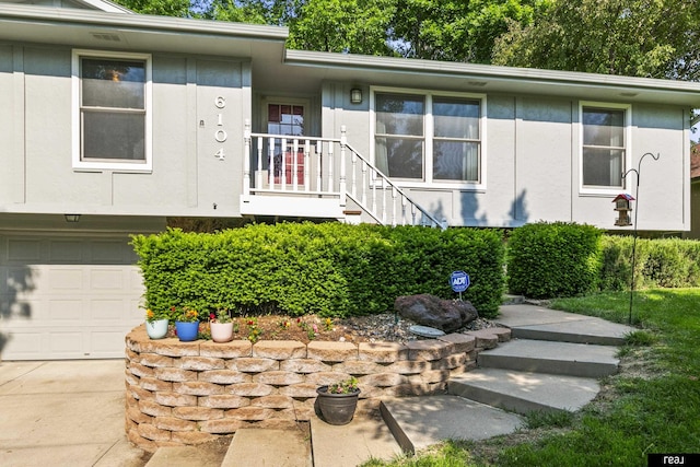 6104 S 93rd St, Omaha, NE 68127 - view of front of home featuring an attached garage and driveway