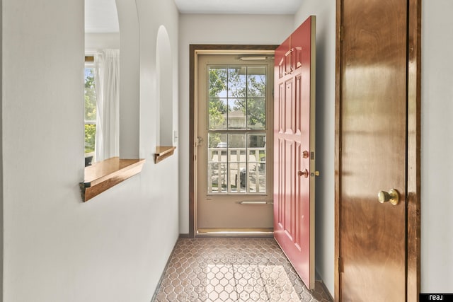 6104 S 93rd St, Omaha, NE 68127 - entryway featuring baseboards and arched walkways
