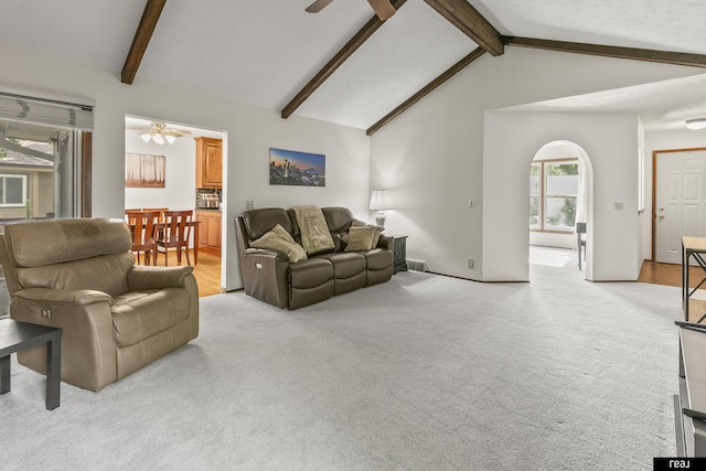 6104 S 93rd St, Omaha, NE 68127 - living room with ceiling fan, light carpet, beam ceiling, and high vaulted ceiling