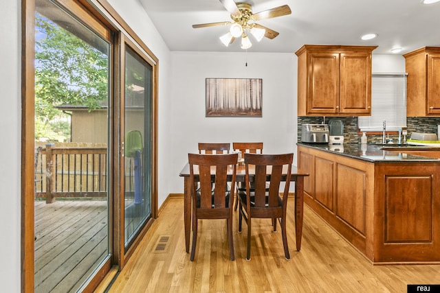 6104 S 93rd St, Omaha, NE 68127 - dining area with light wood finished floors, ceiling fan, and recessed lighting