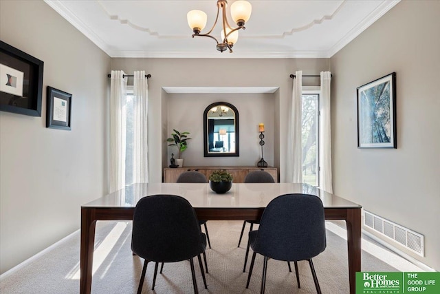 802 N Fillmore St, Papillion, NE 68046 - dining area featuring a chandelier, ornamental molding, and carpet flooring