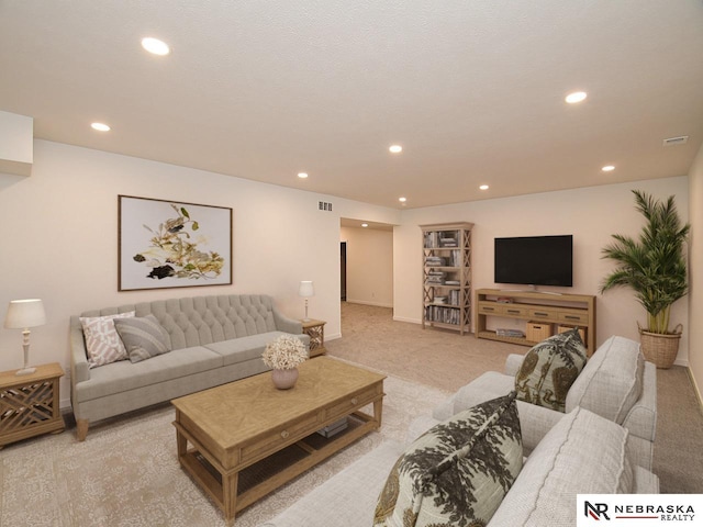 14802 Bruning St, Bennington, NE 68007 - living area with recessed lighting, light carpet, and baseboards