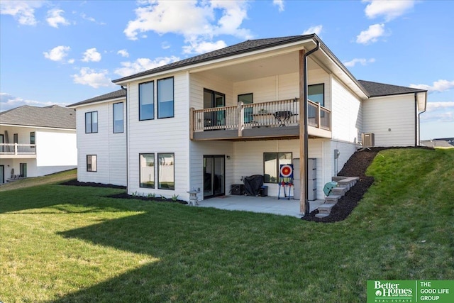 6518 S 208th Ave, Elkhorn, NE 68022 - back of house with a balcony, a patio area, a lawn, and central AC