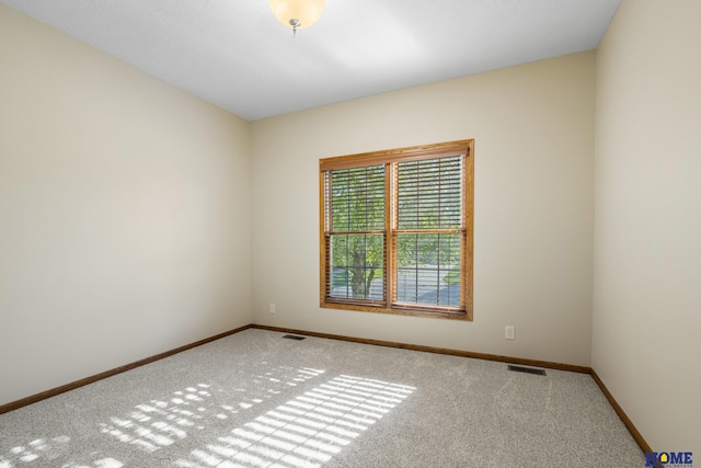 6920 NW 3rd St, Lincoln, NE 68521 - carpeted empty room featuring baseboards