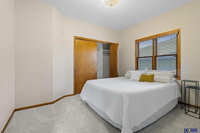 6920 NW 3rd St, Lincoln, NE 68521 - bedroom with carpet flooring, baseboards, and a closet