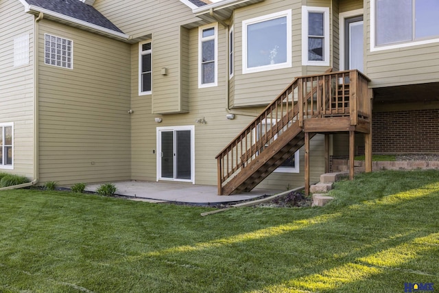 6920 NW 3rd St, Lincoln, NE 68521 - back of house with a patio area, a yard, and roof with shingles