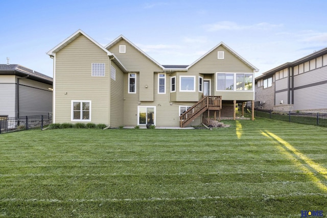 6920 NW 3rd St, Lincoln, NE 68521 - back of house featuring a sunroom and stairway