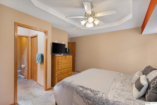 15212 Emmet St, Omaha, NE 68116 - bedroom with a raised ceiling, carpet, and a ceiling fan