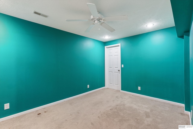 15212 Emmet St, Omaha, NE 68116 - carpeted spare room with a ceiling fan, baseboards, recessed lighting, and a textured ceiling