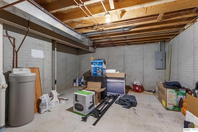 15212 Emmet St, Omaha, NE 68116 - unfinished below grade area featuring electric panel, a water softener, and brick wall