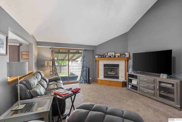 15212 Emmet St, Omaha, NE 68116 - carpeted living area featuring vaulted ceiling and a tile fireplace