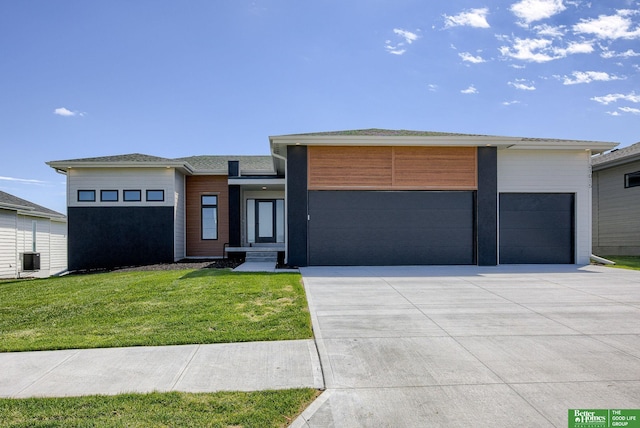 21056 Joseph St, Elkhorn, NE 68022 - view of front facade featuring a front lawn and cooling unit