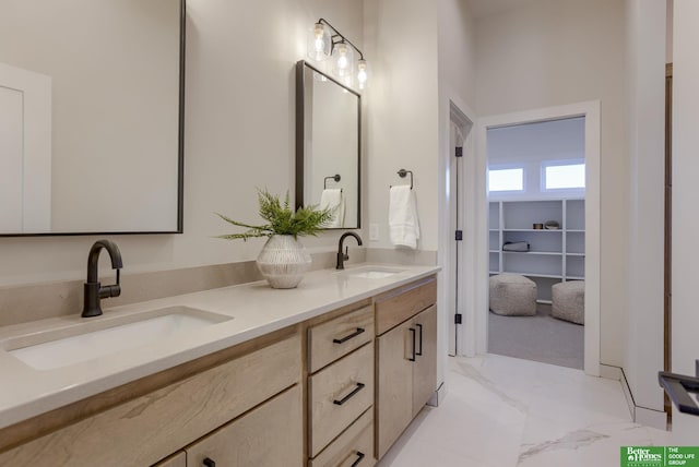 21056 Joseph St, Elkhorn, NE 68022 - full bathroom featuring double vanity and marble finish floors