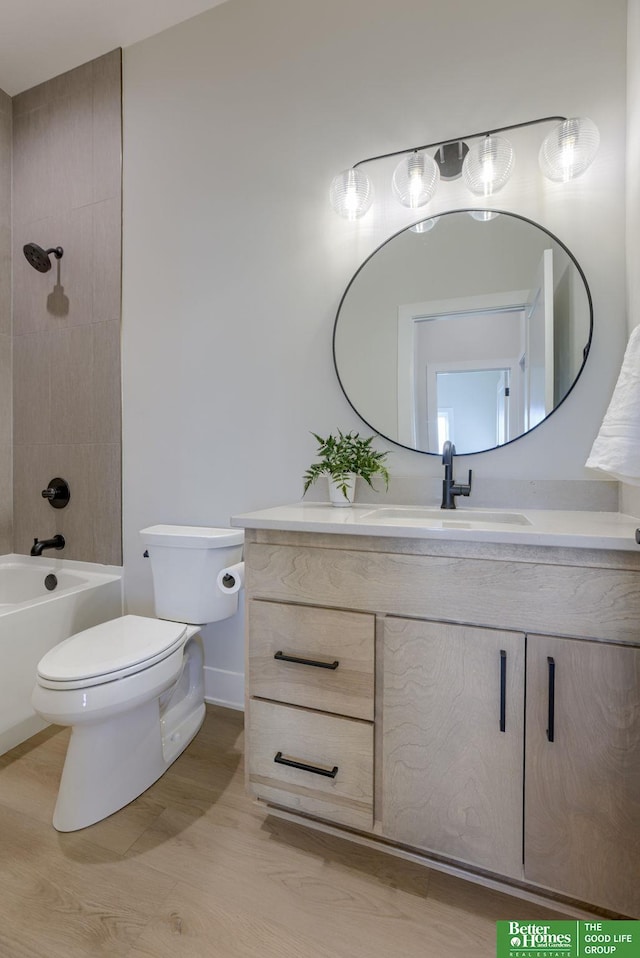 21056 Joseph St, Elkhorn, NE 68022 - full bath with toilet, vanity, shower / washtub combination, and baseboards