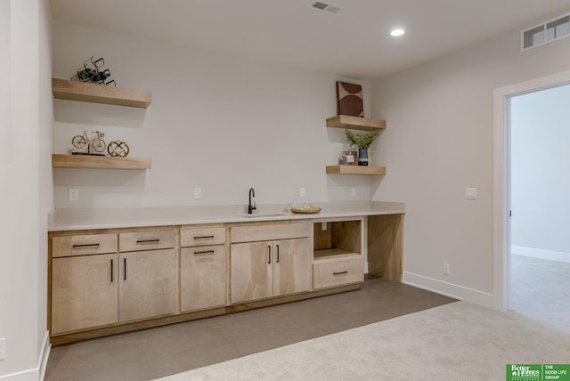 21056 Joseph St, Elkhorn, NE 68022 - bar area with a sink, recessed lighting, and baseboards