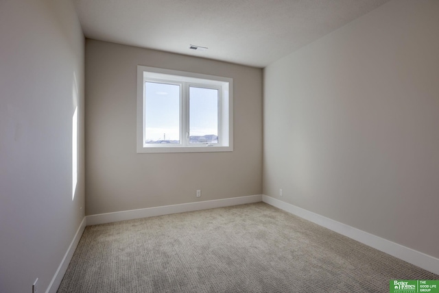 21056 Joseph St, Elkhorn, NE 68022 - unfurnished room featuring light carpet and baseboards