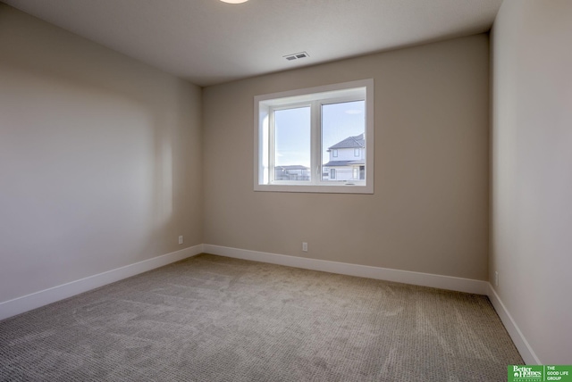 21056 Joseph St, Elkhorn, NE 68022 - spare room with light carpet and baseboards