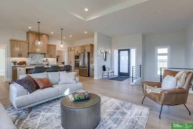 21056 Joseph St, Elkhorn, NE 68022 - living area featuring light wood-type flooring and recessed lighting