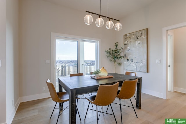 21056 Joseph St, Elkhorn, NE 68022 - dining room with light wood-style floors and baseboards
