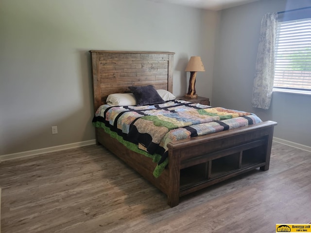 843 N 26th St, Beatrice, NE 68310 - bedroom featuring wood finished floors
