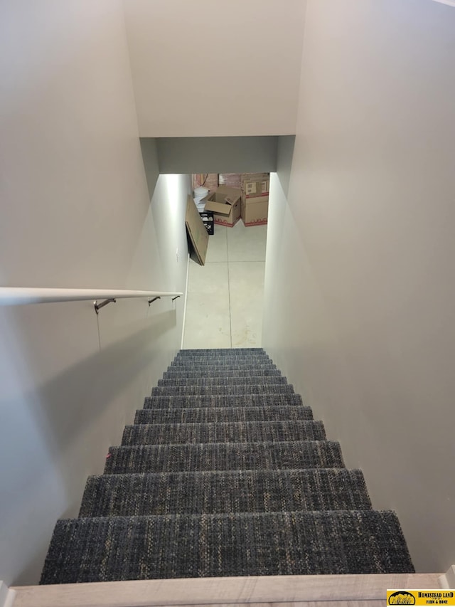843 N 26th St, Beatrice, NE 68310 - stairway featuring tile patterned flooring