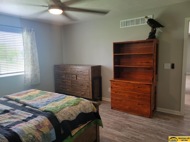 843 N 26th St, Beatrice, NE 68310 - bedroom featuring wood finished floors and ceiling fan