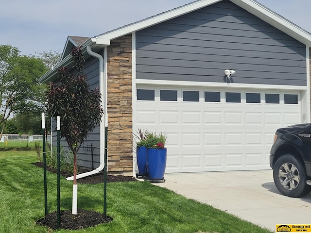 843 N 26th St, Beatrice, NE 68310 - garage featuring concrete driveway