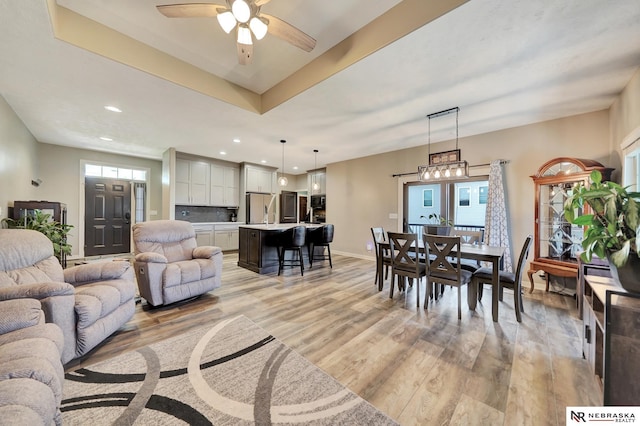 905 Chicory Ln, Hickman, NE 68372 - living area featuring light wood-type flooring, a ceiling fan, recessed lighting, and baseboards