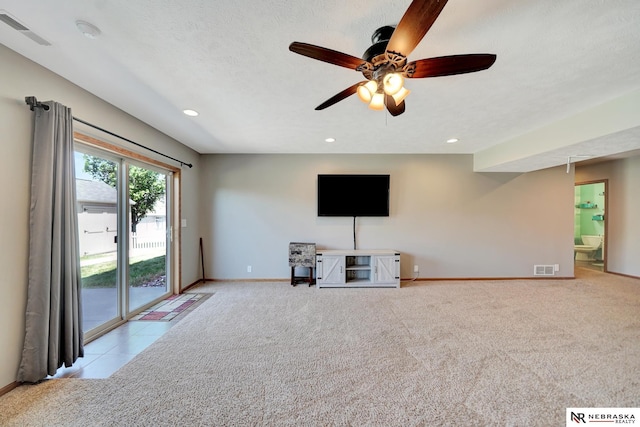 905 Chicory Ln, Hickman, NE 68372 - unfurnished living room with carpet flooring, baseboards, ceiling fan, and recessed lighting