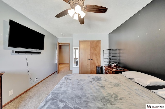 905 Chicory Ln, Hickman, NE 68372 - bedroom featuring light colored carpet, baseboards, and a ceiling fan