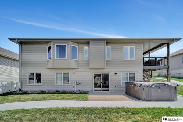 905 Chicory Ln, Hickman, NE 68372 - back of property featuring a hot tub and a patio