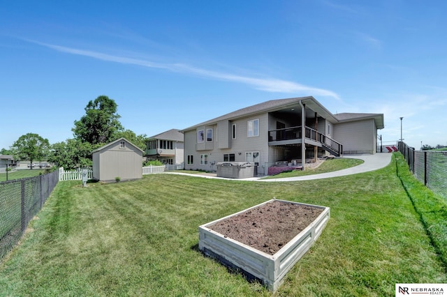 905 Chicory Ln, Hickman, NE 68372 - back of house featuring a hot tub