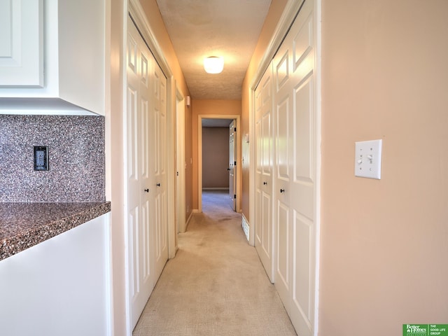 6212 Oak Hills Plz, Omaha, NE 68137 - hallway featuring light carpet
