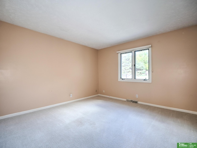 6212 Oak Hills Plz, Omaha, NE 68137 - spare room with carpet flooring and baseboards